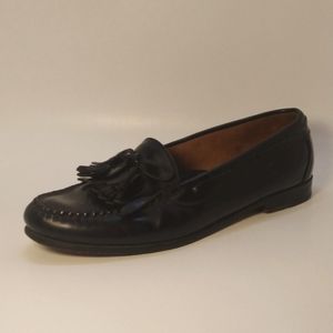 Black Cole Haan tassle loafers